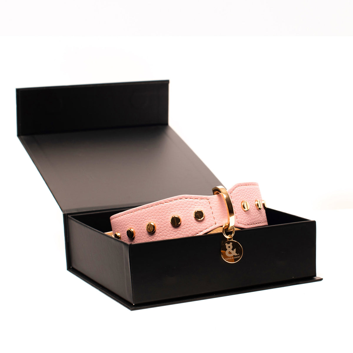 Rufus & Coco's Berlin Rose leather dog collar is made from 100% quality leather. Each collar is finished with premium gold hardware and studs for style and durability. The Rose leather dog collar is available in 4 sizes.