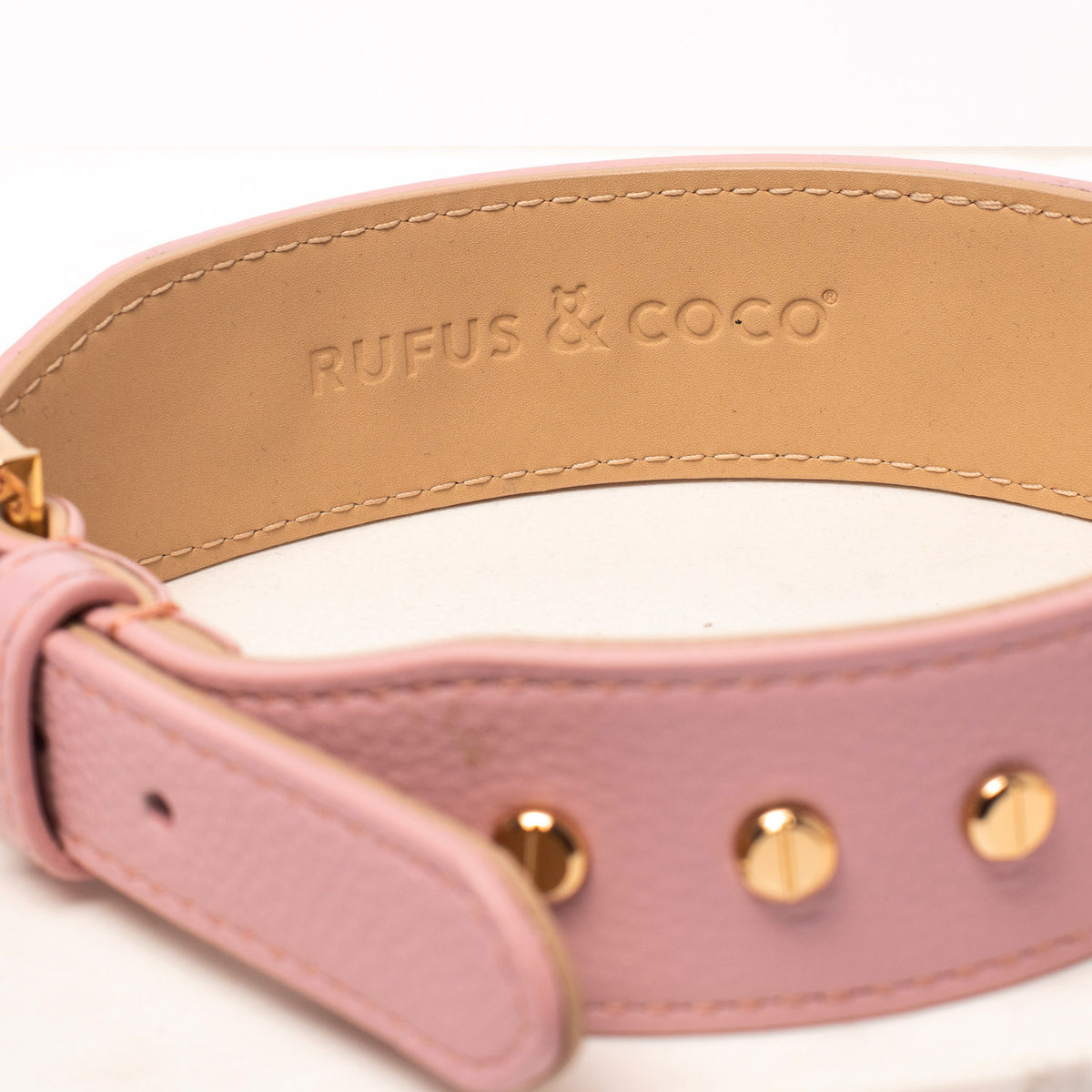 Rufus & Coco's Berlin Rose leather dog collar is made from 100% quality leather. Each collar is finished with premium gold hardware and studs for style and durability. The Rose leather dog collar is available in 4 sizes.