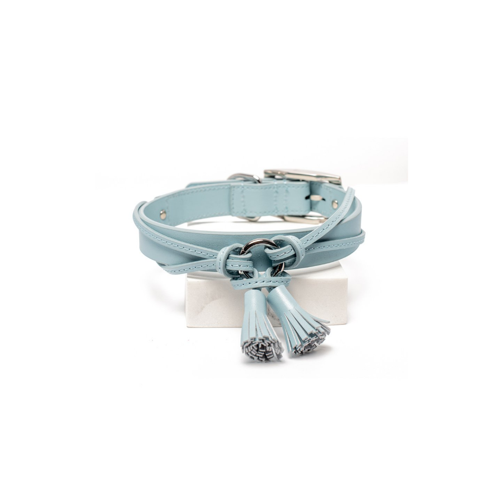 Rufus & Coco's Paris light blue leather dog collar is made from 100% quality leather. Each collar is finished with light blue stitching, matching leather tassles and premium silver hardware for style and durability. This fashionable light blue leather dog collar is available in 4 sizes.