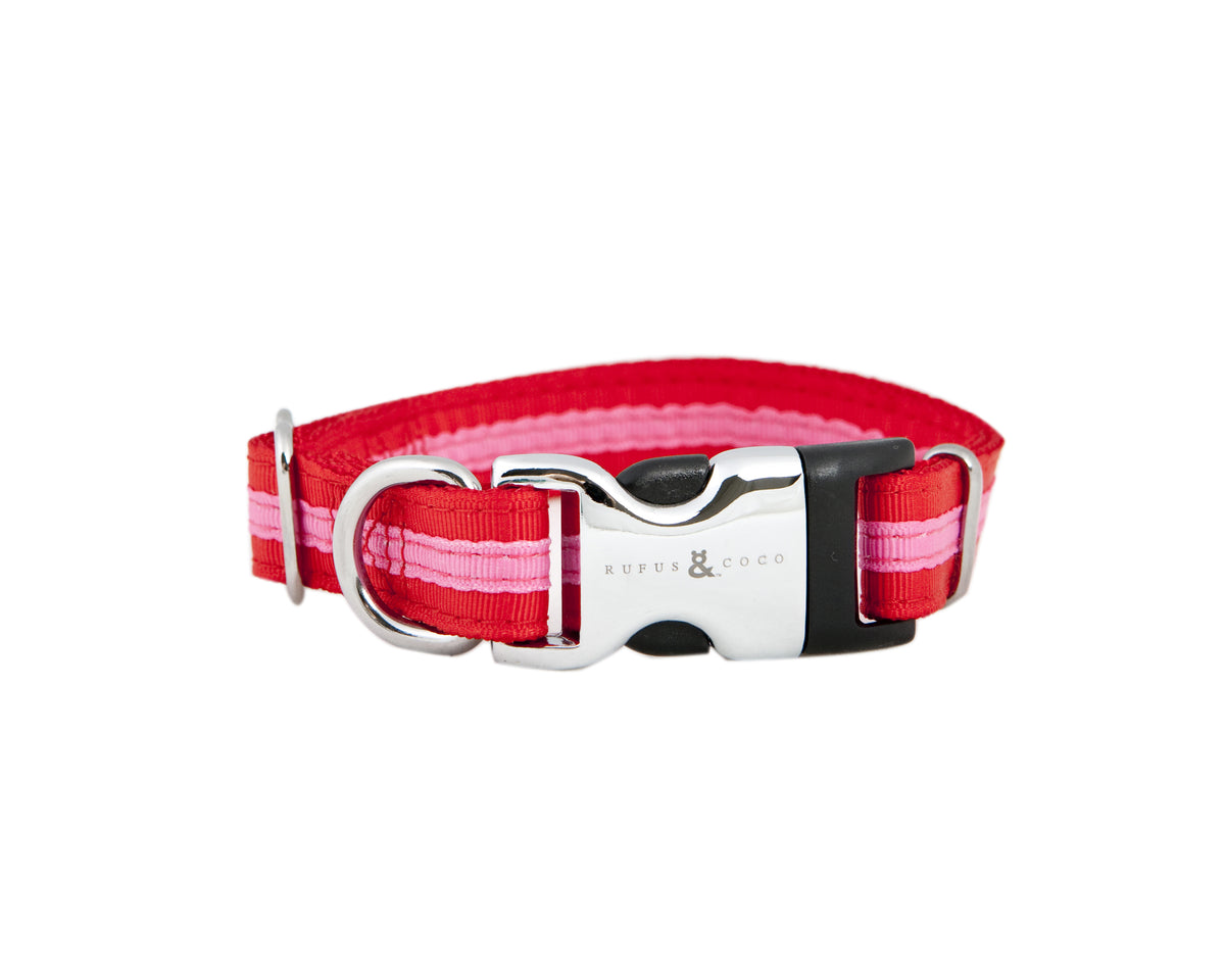 Our gorgeous Bronte Collar is a best-seller! The premium striped nylon collar has a signature R&C silver etched clip, and makes a bold colour statement.Our best selling premium striped nylon dog collar. Comes with a signature Rufus and Coco silver etched clip. Availabe in 4 colours and 2 sizes. To ensure that you have the correct collar size, measure your dog's neck and allow one finger space between the collar and your dog's neck.